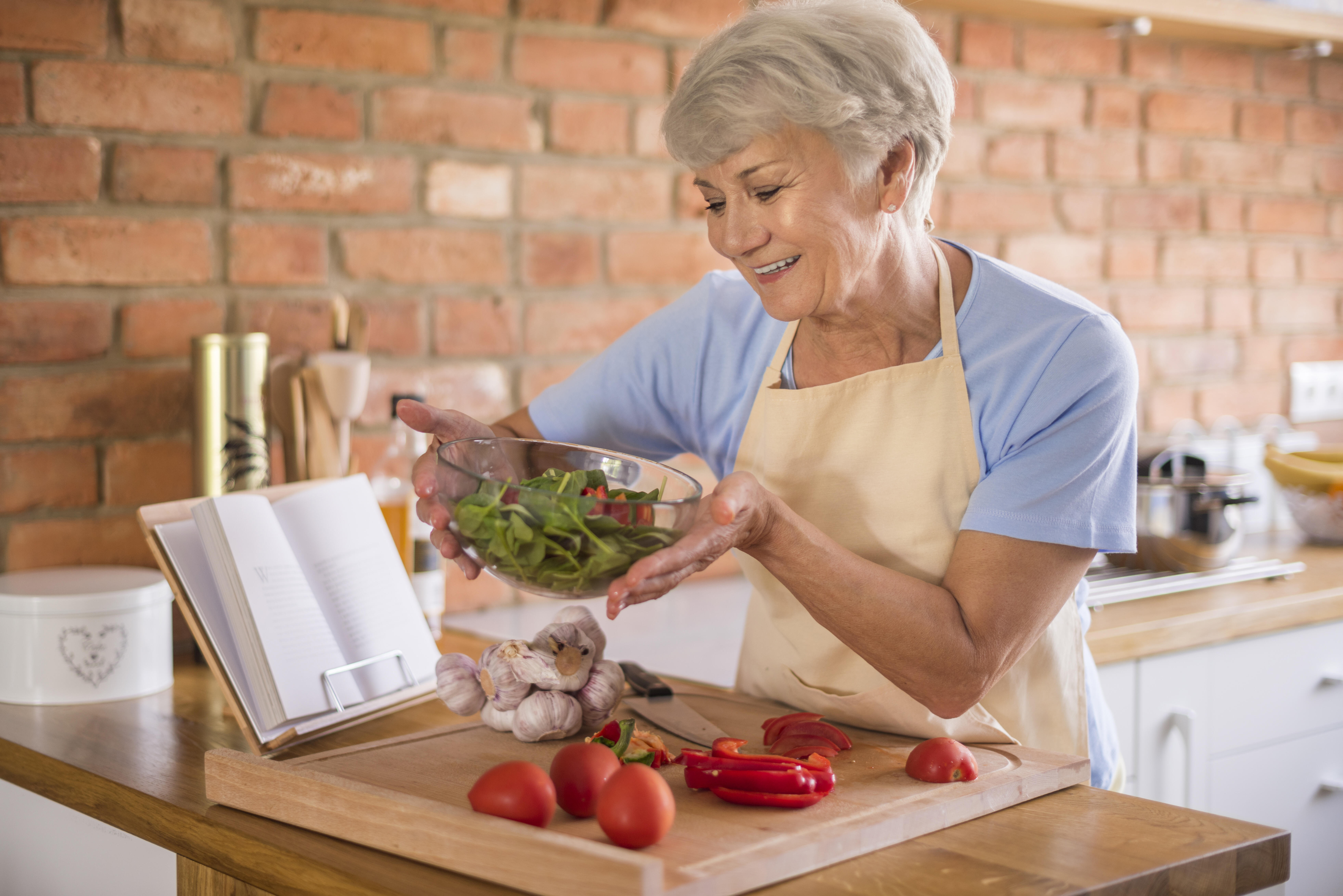 Elderly Woman Cooking